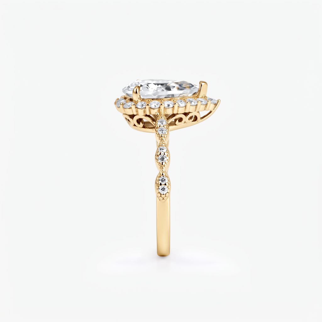 Pear Moissanite Halo Twist Pavé Ring