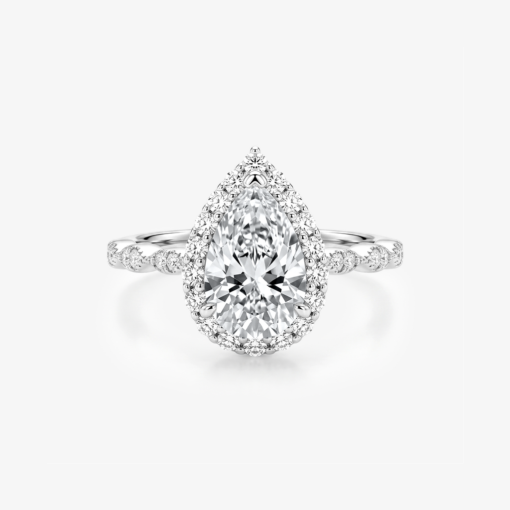 Pear Moissanite Halo Twist Pavé Ring
