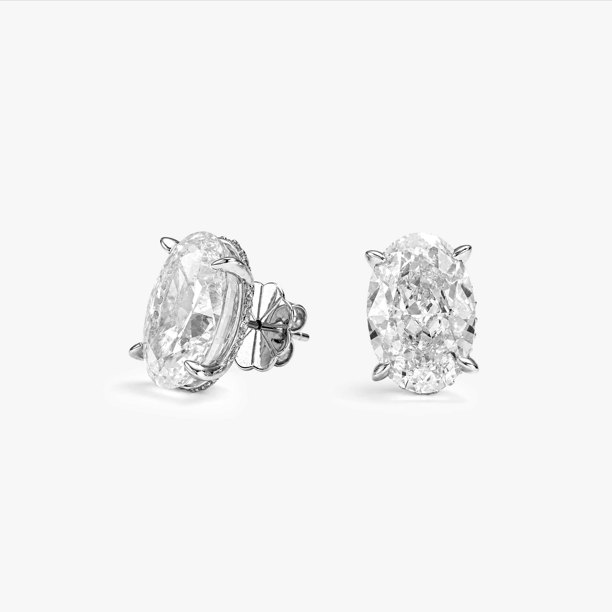Oval Cut Moissanite Stud Earrings in White Gold
