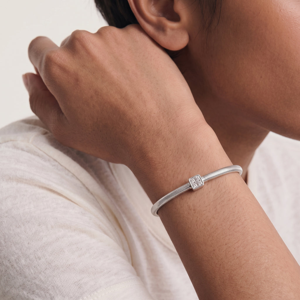 Moissanite Pavé Square Solitaire Station Coil Bangle