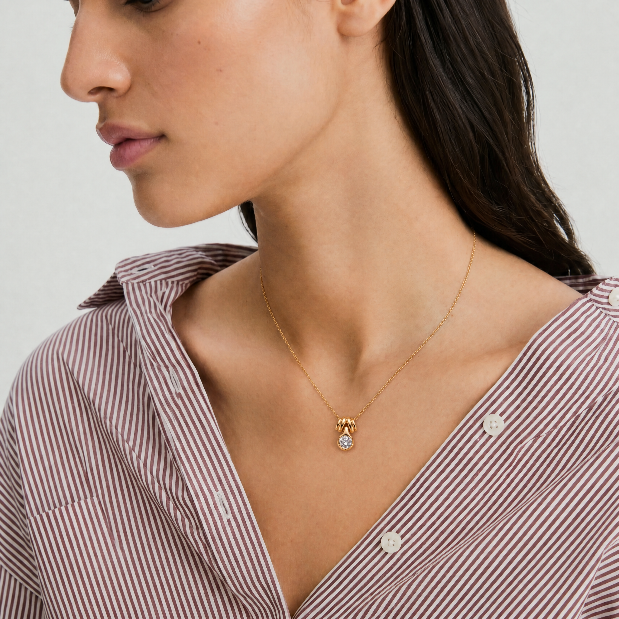 Moissanite Bezel Knot Pendant Necklace in Rose Gold